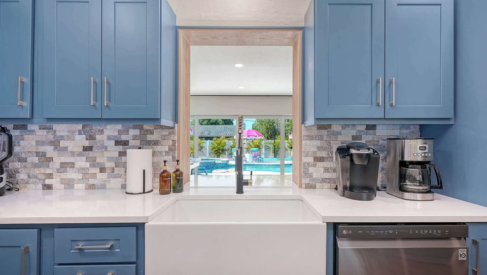 Morning coffee with an amazing view. Drip and Keurig pod machines, a deep farmhouse sink, and room to cook for a crowd.