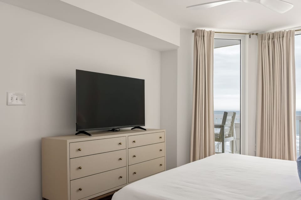 Rest comfortably in your bright bedroom with modern amenities and peaceful balcony access for morning coffee or evening relaxation.