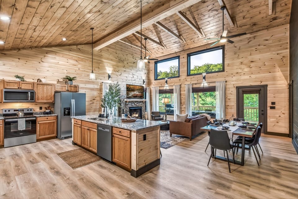 As you enter the cabin you are greeted by a vaulted ceiling with ample natural light and an open floorplan perfect for gathering 