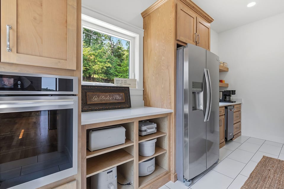 Galley with second fridge, oven, ice maker, coffee bar