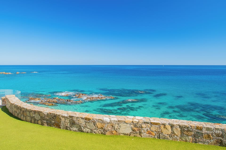 Oceanfront property with stunning turquoise waters and pristine coastline views, offering an idyllic Mediterranean setting for a peaceful retreat.