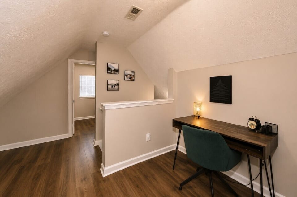Dedicated workspace located between Bedroom 2 and 3 and upstairs bathroom and laundry