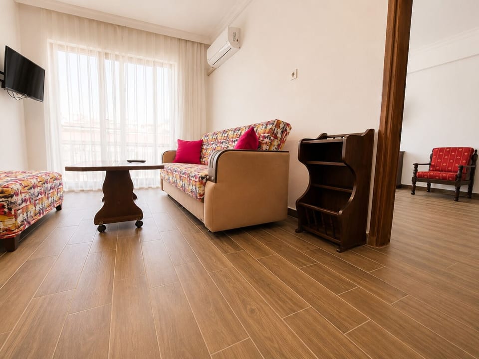 Family Quadruple Room, Beach View, Beachside | Living area