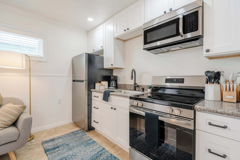 Kitchenette stocked with essentials for light meals and coffee