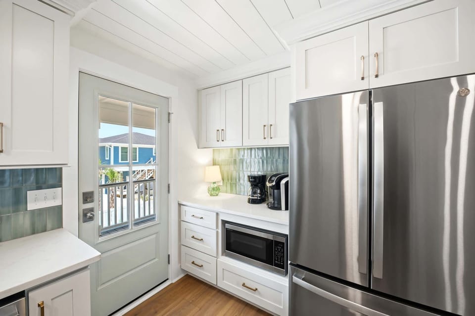Modern appliances and ample counter space for cooking.