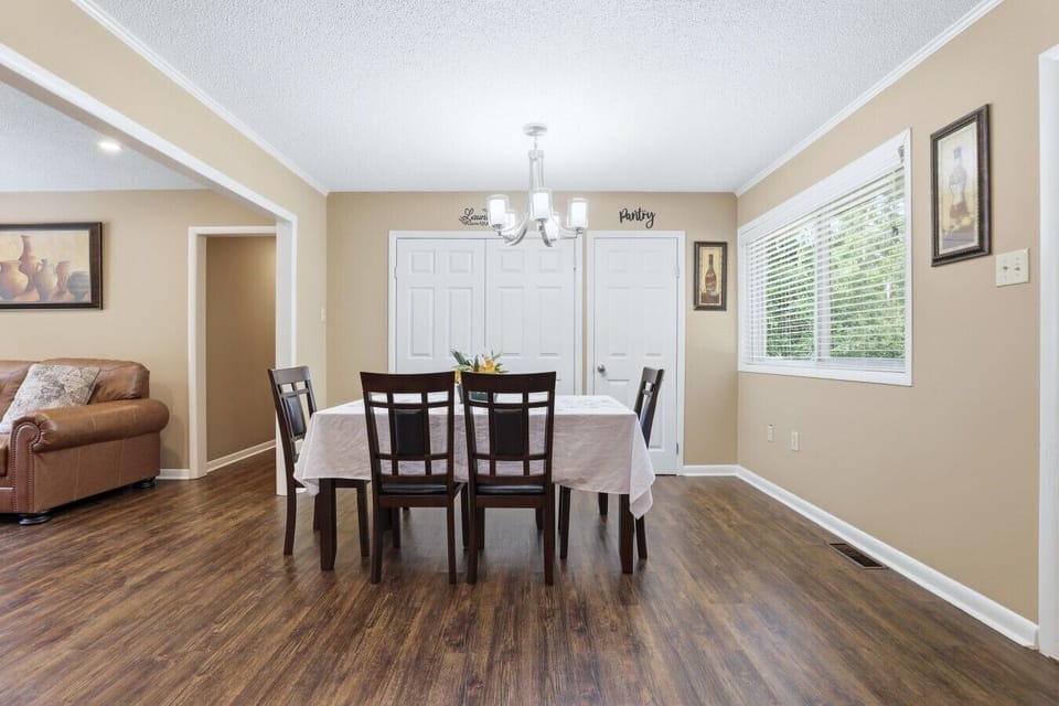 Dining Area | Chandelier Lighting | Pantry & Laundry Access