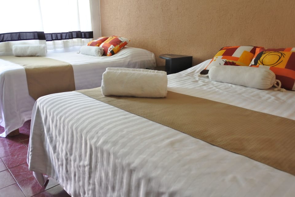 Standard Quadruple Room | WiFi (free), bed sheets