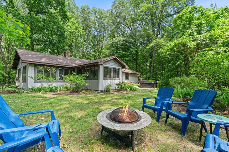 Private fire pit seating and a peaceful backyard