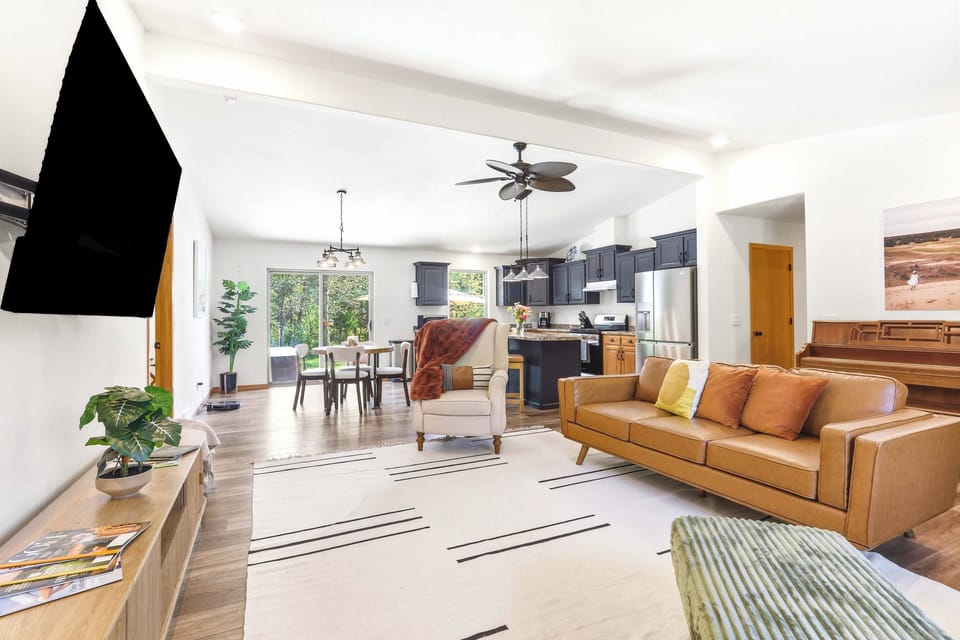 Gather, cook, and unwind with ease in an open-concept living space designed for relaxed connection and cozy nights in.