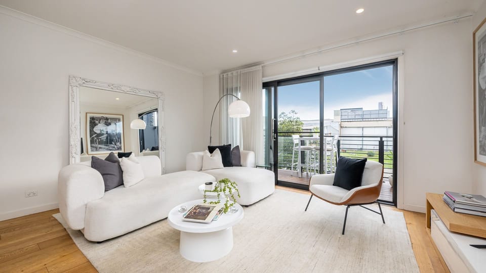 Living room leading to the balcony 
