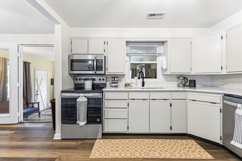 Bright updated kitchen with stainless appliances and plenty of counter space