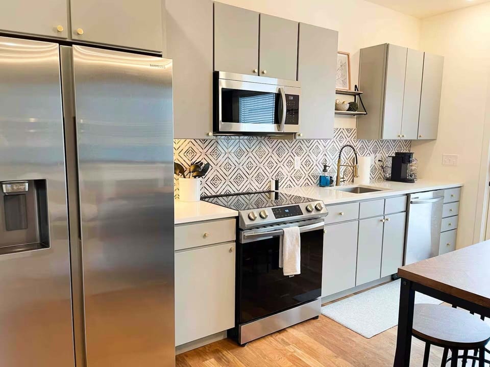Fully applianced kitchen with all the cooking essentials and stainless appliances