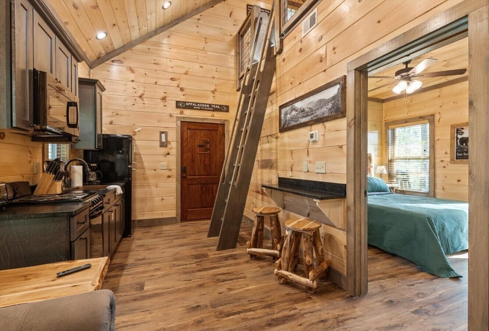 Full kitchen with stove, refrigerator, drip coffee maker