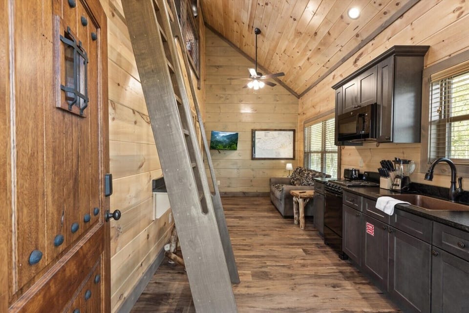 Ladder to get to loft with queen bed