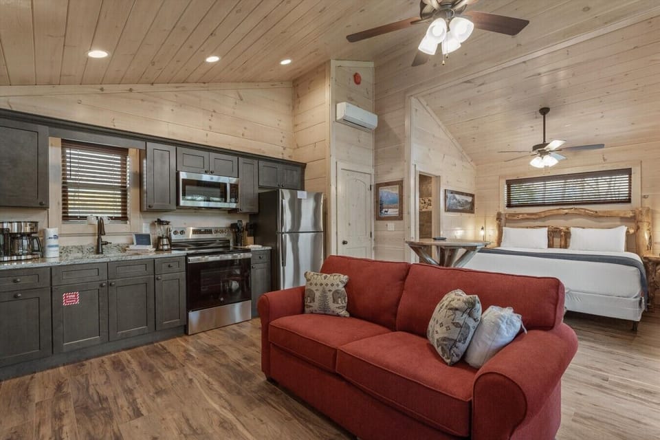 Living space with full kitchen, smart tv, dining, electric fireplace