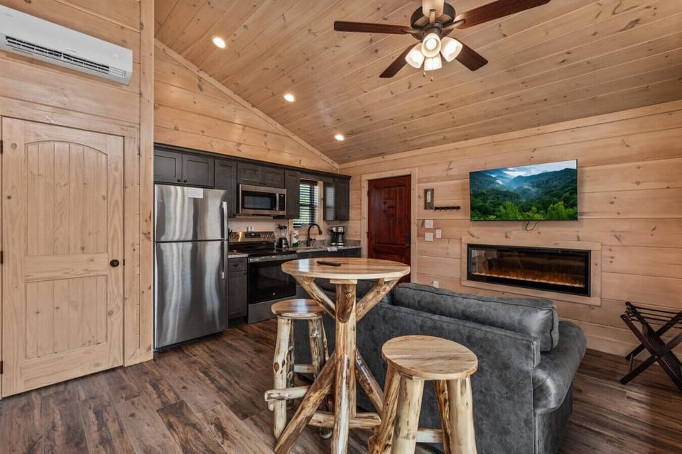 Full kitchen with stove, refrigerator, drip coffee maker