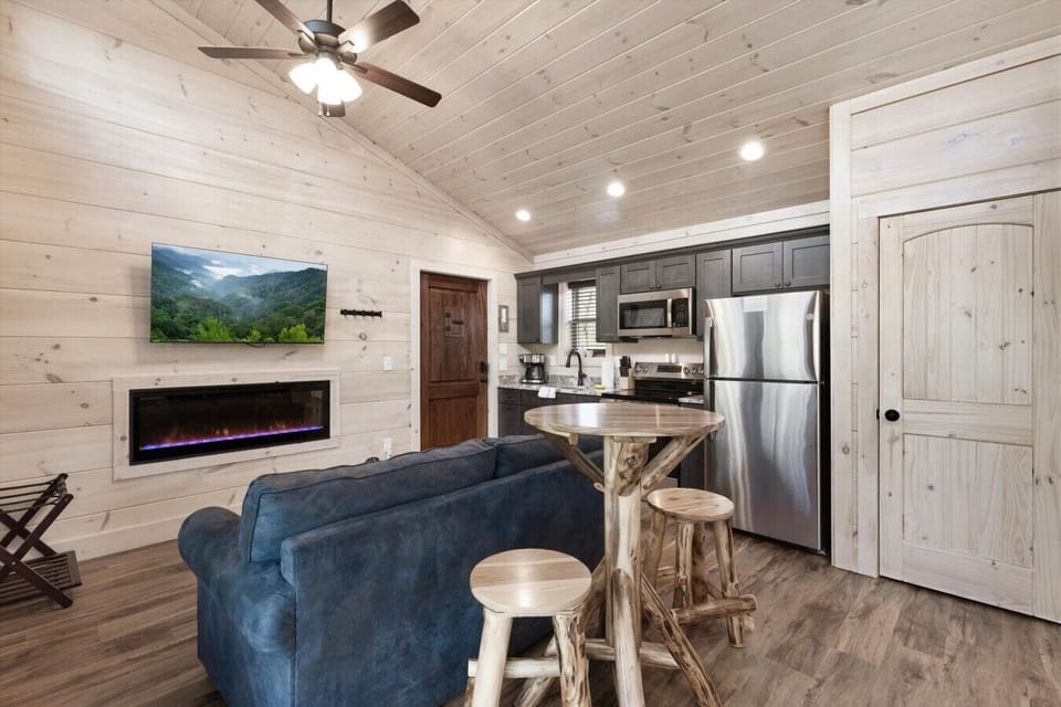 Full kitchen with stove, refrigerator, drip coffee maker