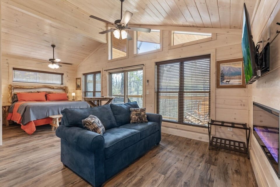 Living space with full kitchen, smart tv, dining, electric fireplace