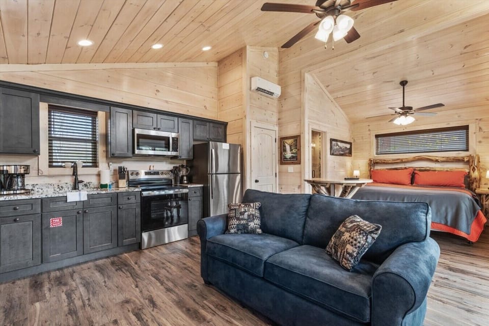 Living space with full kitchen, smart tv, dining, electric fireplace