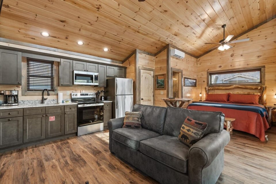 Living space with full kitchen, smart tv, dining, electric fireplace