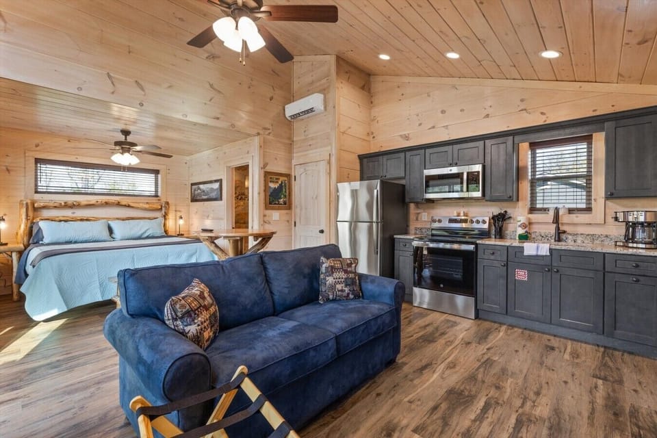 Living space with full kitchen, smart tv, dining, electric fireplace