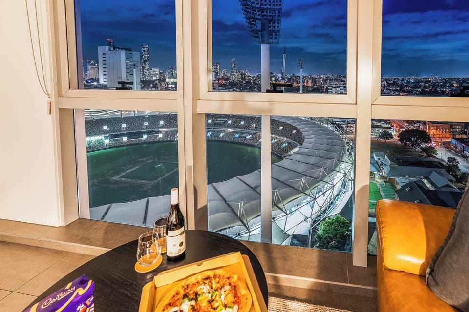 Living room featuring an amazing view of ‘The Gabba’!
