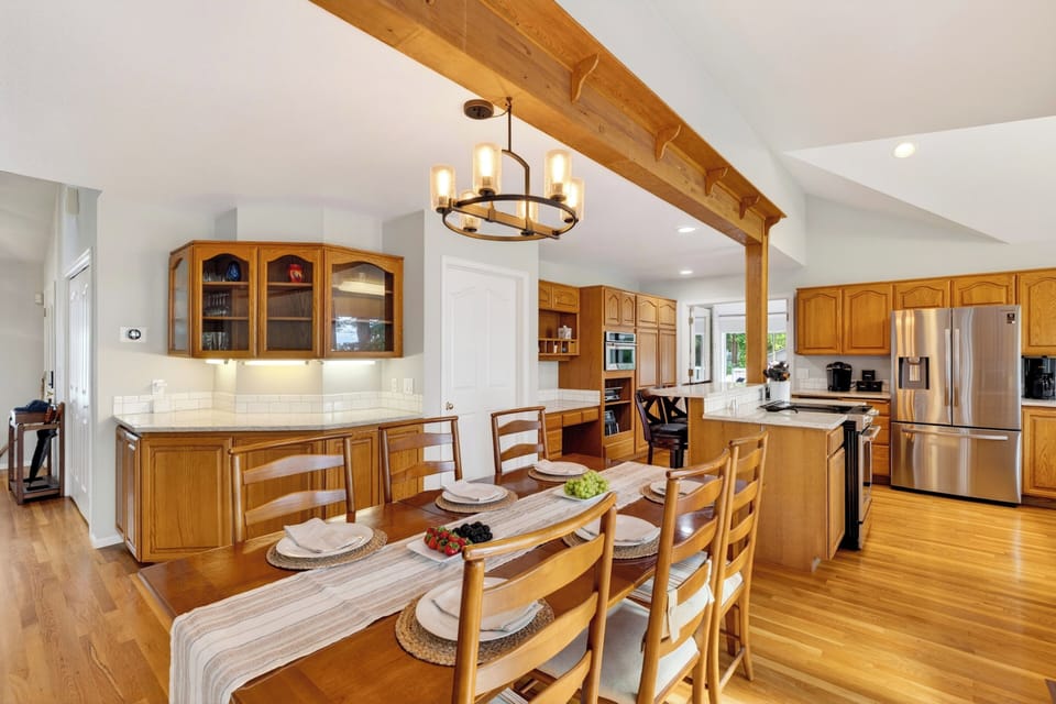 Spacious dining area connects to the full kitchen for easy group meals and gathering.