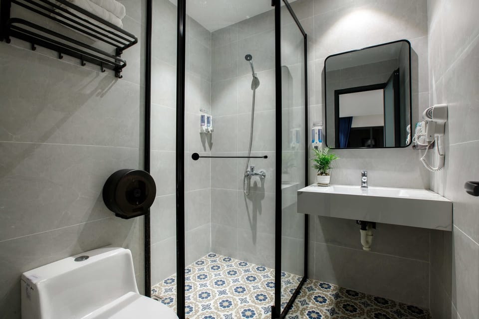 Double Room | Bathroom | Shower, hair dryer, towels, soap