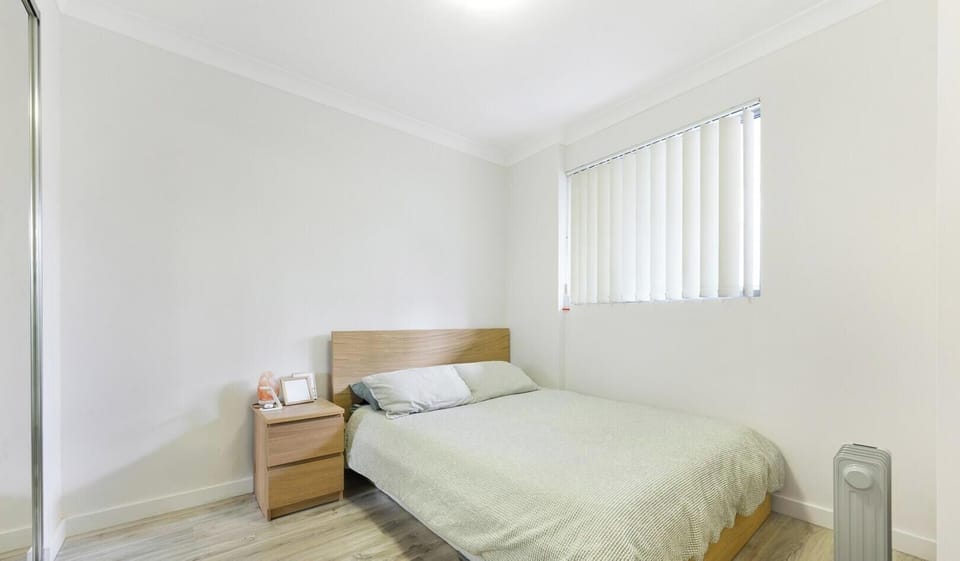 Clean and comfortable bedroom with fresh linens