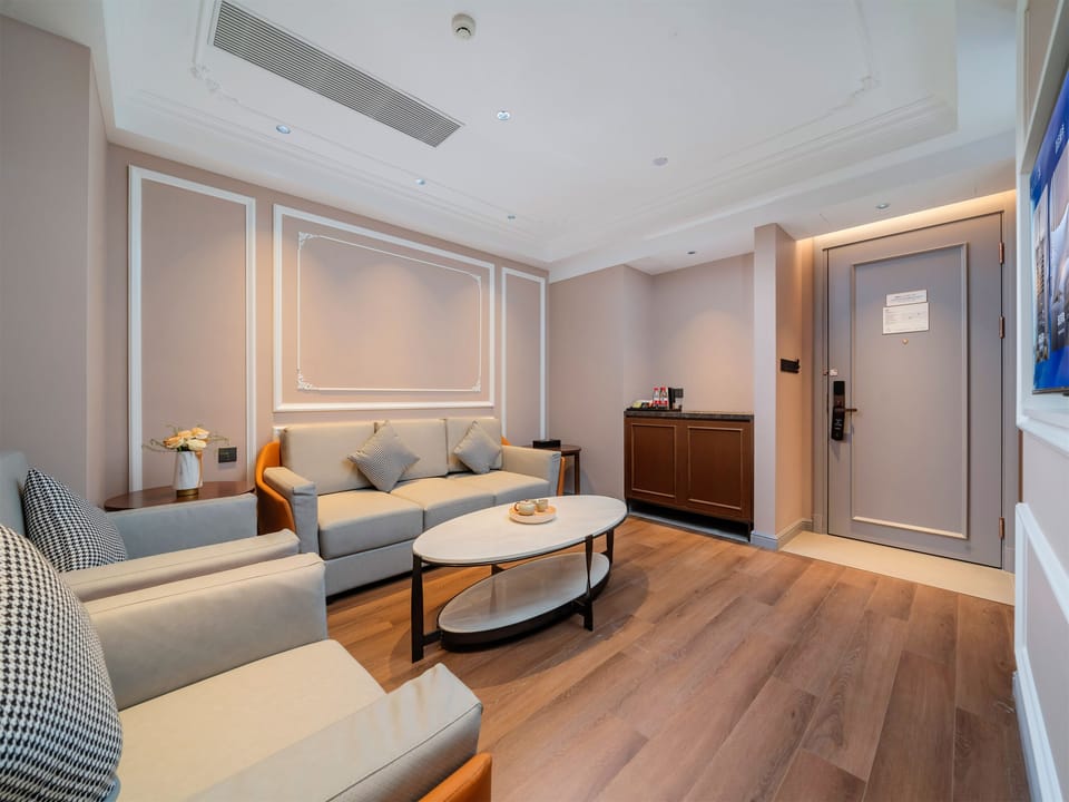 Luxury Suite, City View | Living area | 63-inch LED TV with cable channels, video-game console, first-run movies
