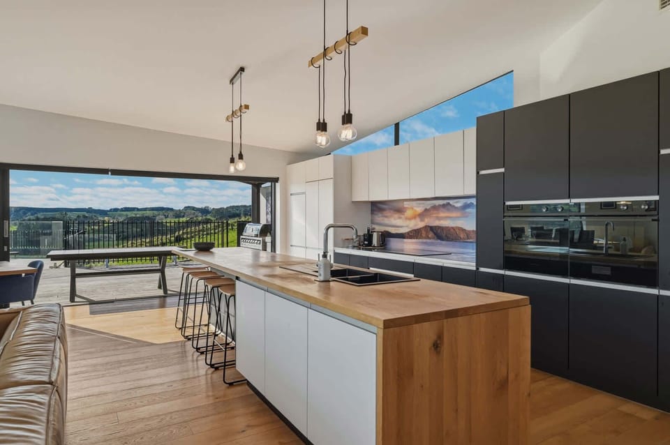 Kitchen island opening to deck