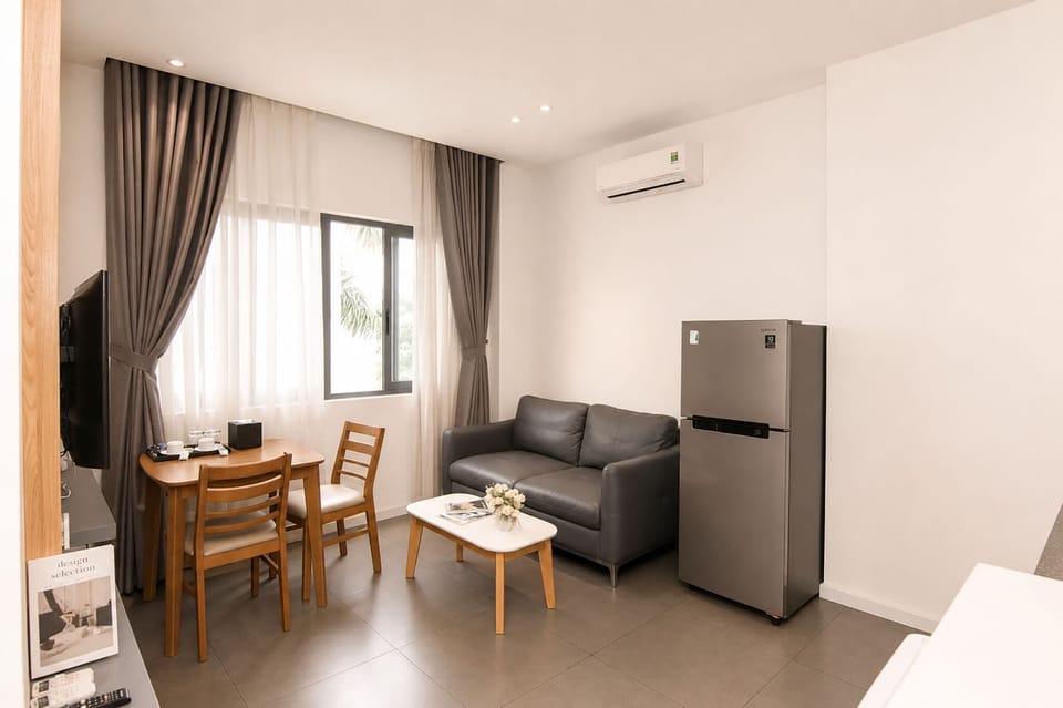 Standard Apartment, 1 Bedroom | Living area | 50-inch LCD TV with satellite channels