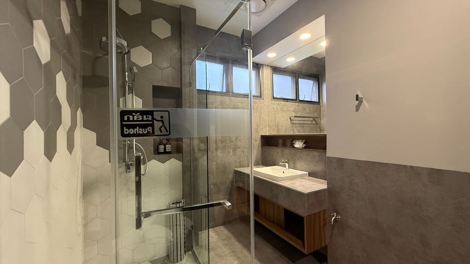 Pool Access A | Bathroom | Shower, hair dryer, slippers, towels