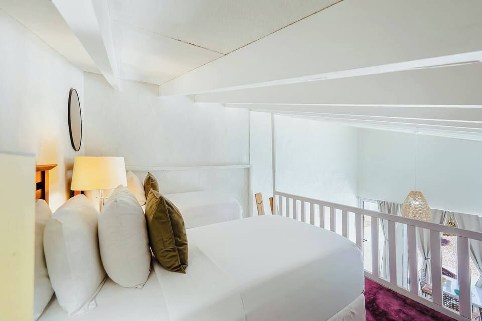 Bedroom 5 includes a cozy loft with two single beds, perfect for kids or extra guests.