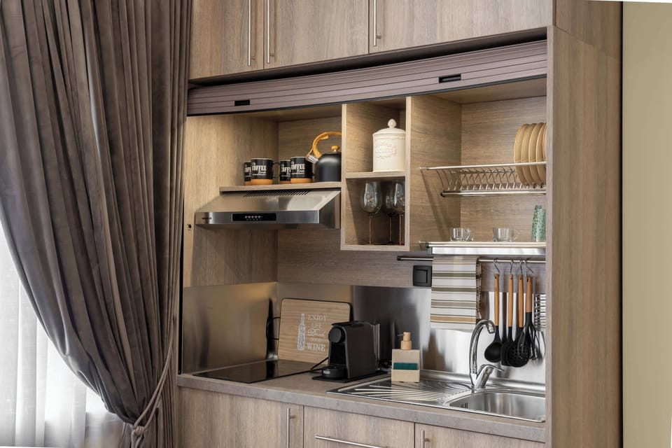 Fully Equipped Kitchenette with Wooden Accents