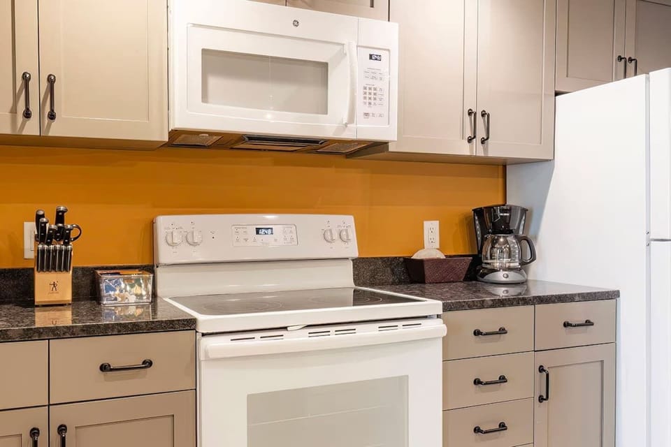 Prepare meals with ease using full-size appliances and cookware.