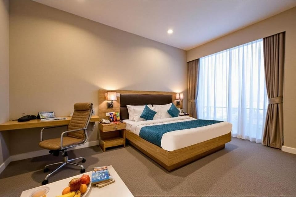 Executive Suite, City View | In-room safe, iron/ironing board, WiFi (free)