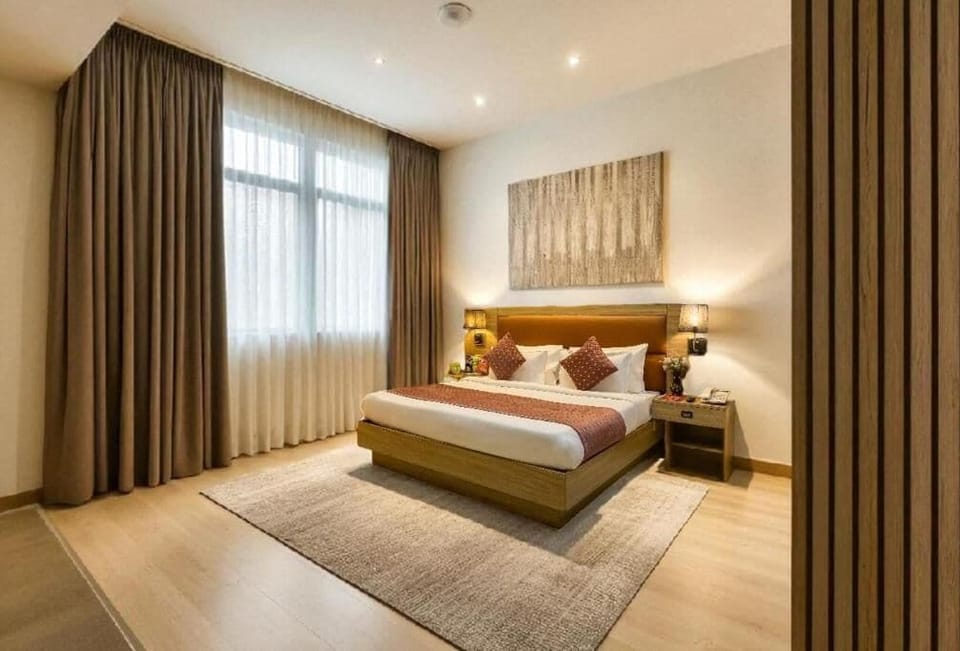 Family Apartment, City View | In-room safe, iron/ironing board, free WiFi