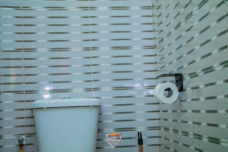 Shower, slippers, towels, soap