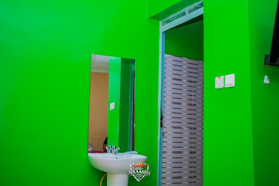 Shower, slippers, towels, soap