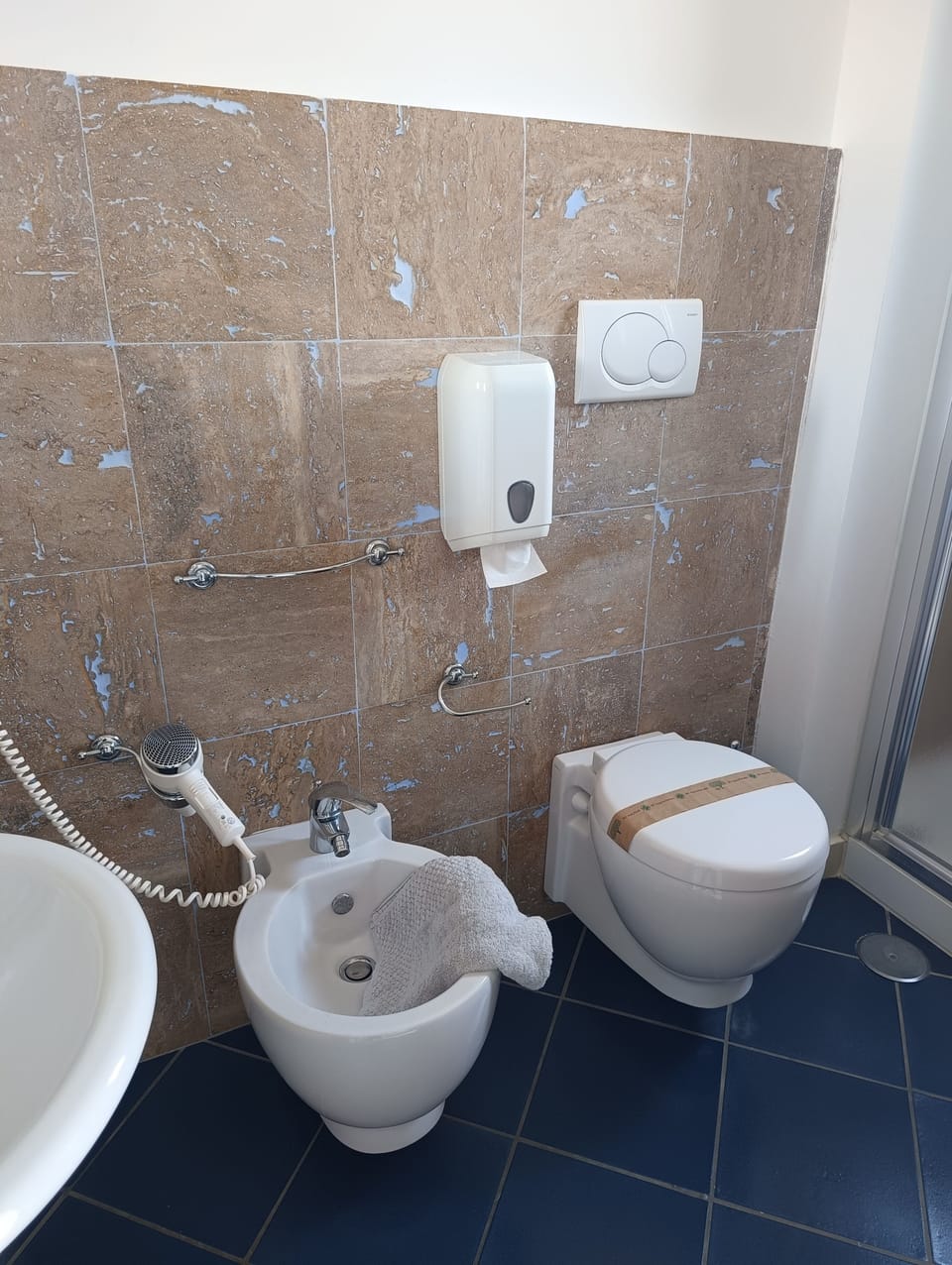Junior Suite, Balcony, Partial Ocean View | Bathroom | Shower, hair dryer, slippers, towels