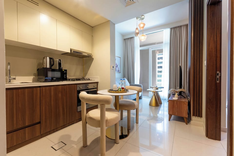 Deluxe Apartment, Balcony, Lake View | Private kitchen | Espresso maker, coffee/tea maker, full-size fridge, microwave