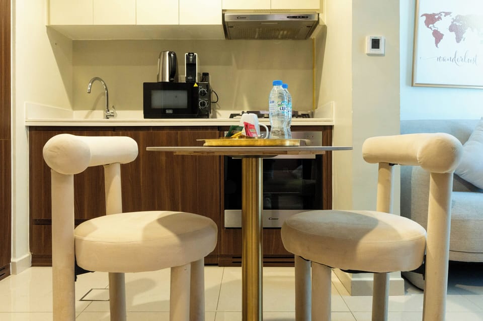 Deluxe Apartment, Balcony, Lake View | Private kitchen | Espresso maker, coffee/tea maker, full-size fridge, microwave
