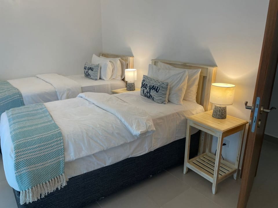 Deluxe Bungalow, Garden View | In-room safe, desk, laptop workspace, iron/ironing board