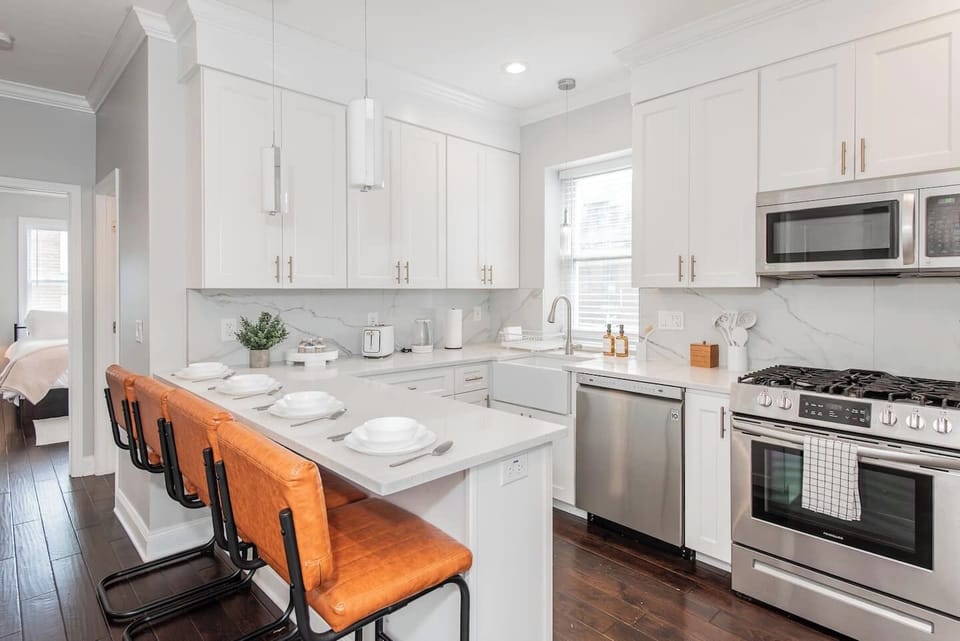 Gourmet Kitchen – Fully equipped with stainless steel appliances and all the essentials for home cooking.