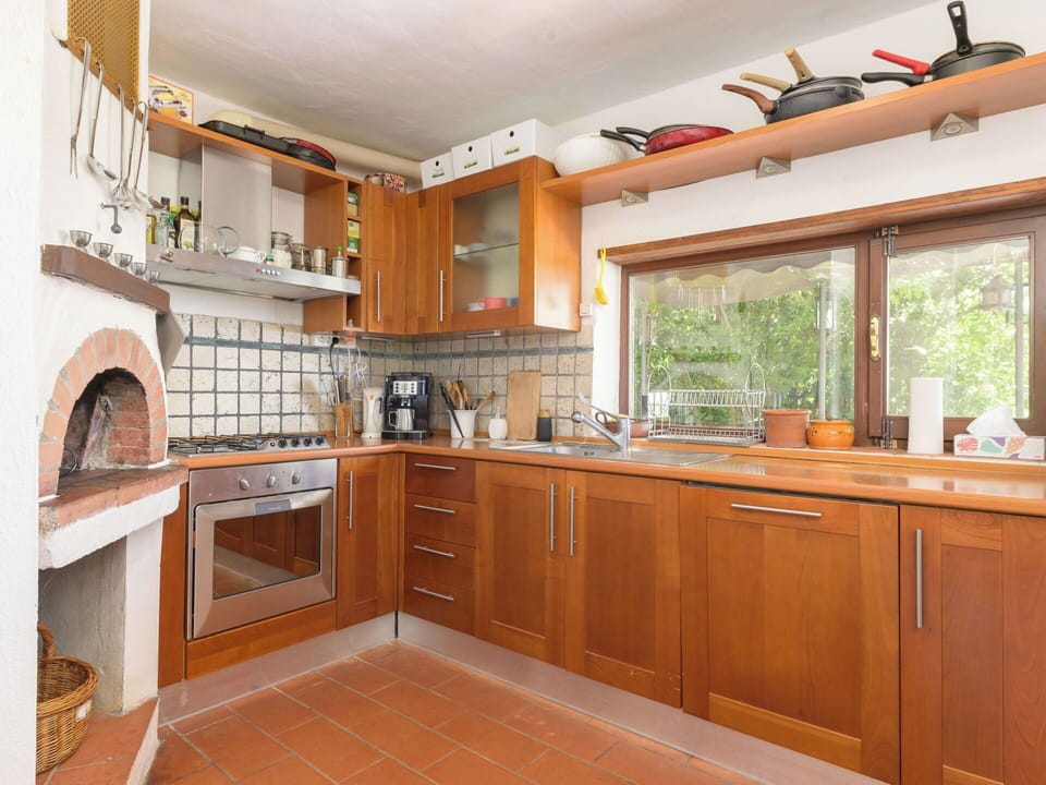 Kitchen, Kitchen Appliance, Countertop, Furniture, Cabinetry, Major Appliance, Interior Design, Flooring, Wood, Ceiling