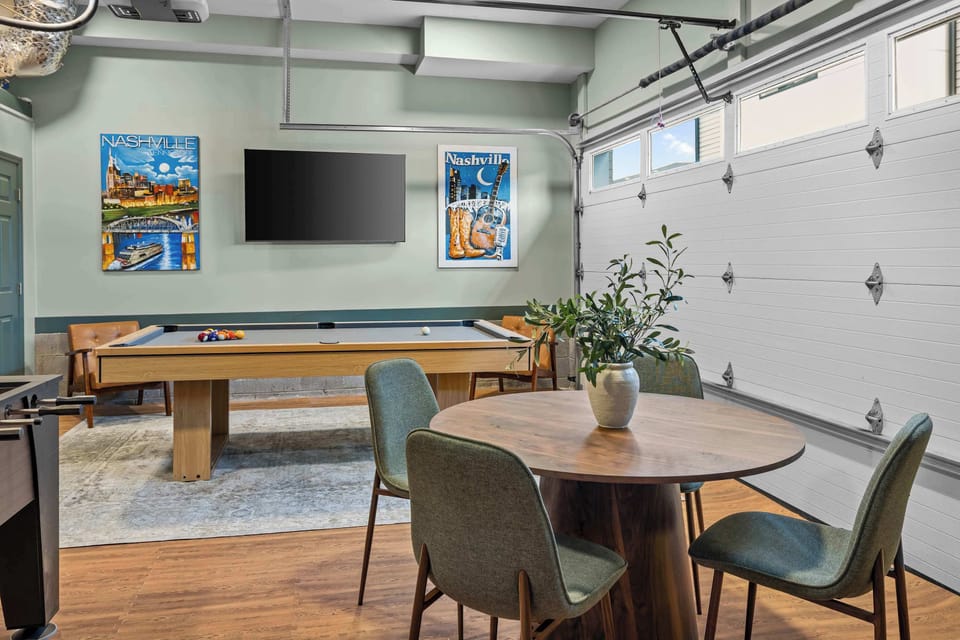 The game room’s round dining table doubles as the perfect poker setup. Pull up a chair, roll out the full poker set, and settle in for the night. Pool table and TV keep the energy going in the background. - Iron Horse