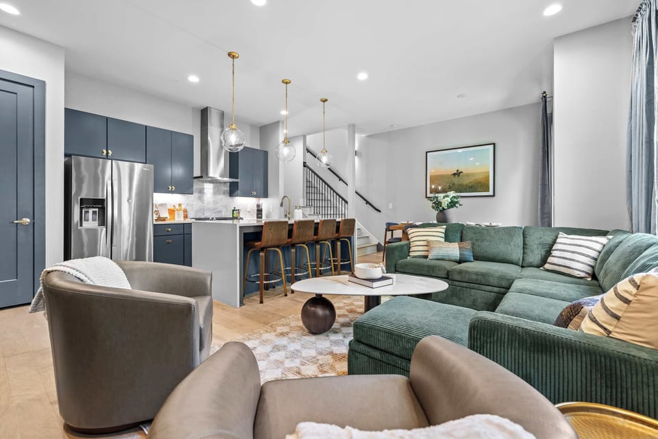 From the sectional to the island bar seating, this space was designed for groups who want to be together without being on top of each other. — The Iron Horse