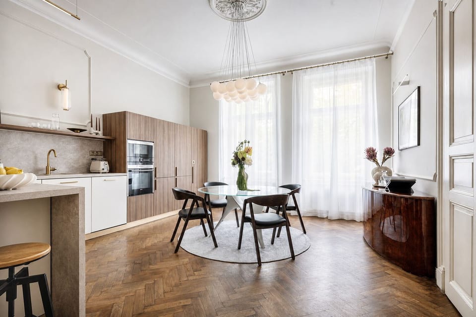 Bright designer kitchen and dining space with elegant natural light