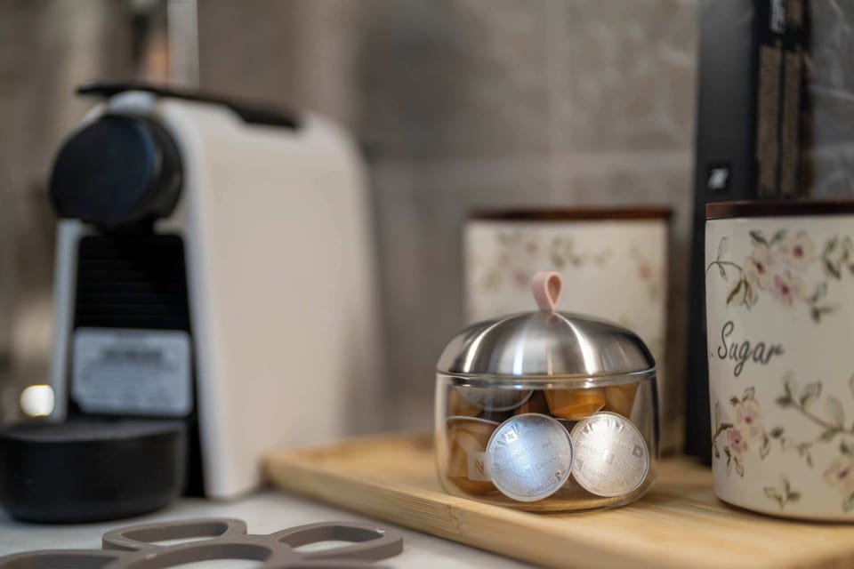 Thoughtful kitchen details, including premium coffee amenities, add a sense of comfort and ease to the residence.